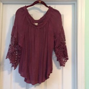 Deep purple. Hangs beautifully on fit.